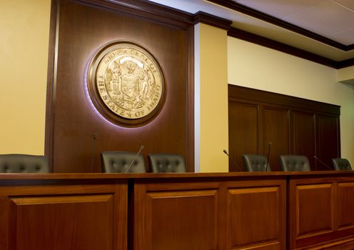 Row of seats behind a desk in the the idaho capital building