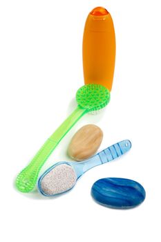 Washed shampoo and brushes on a white background