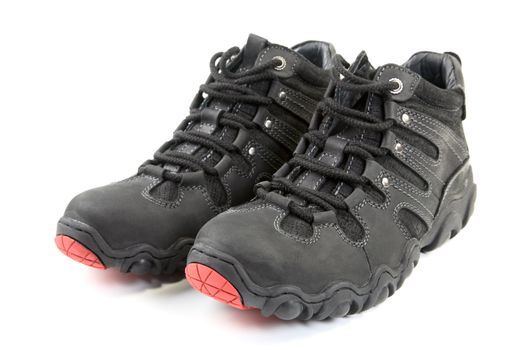 Pair of man's sports boots isolated on a white background