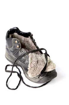 Old winter boot with  lace isolated on a white background