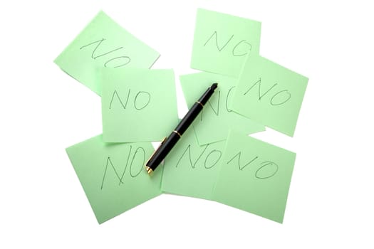 Pen and sticky note on a white background