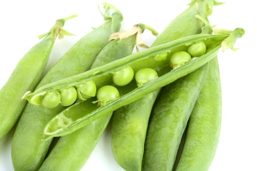 fresh peas isolated on white background
