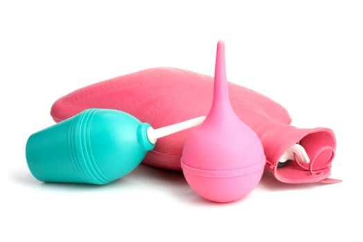 Medical hot-water bottle and colonic bulb for procedures on a white background