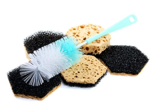 Sponges and  brush for ware washing isolated on a white background