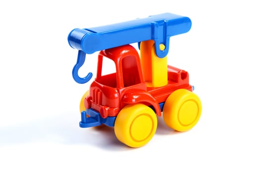 Children's toy the car-crane isolated on a white background