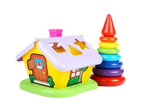 Children's toys  small house and  pyramid on a white background