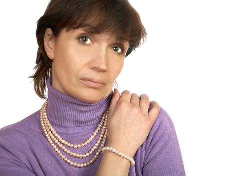 Portrait of the woman with adornment on a white background