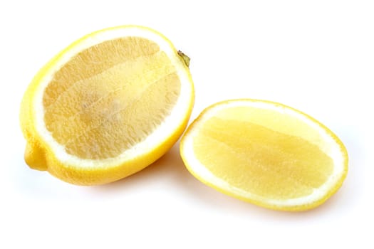 The cut lemon isolated on a white background