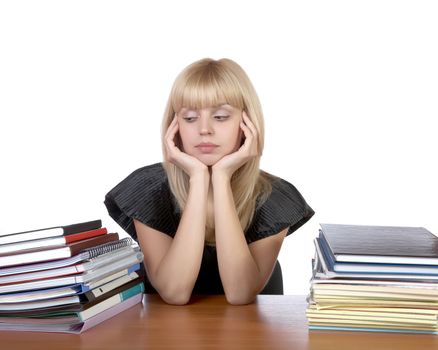 girl with two piles of writing-books and notebooks on a white background