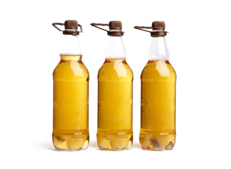 Three bottles of light beer on a white background