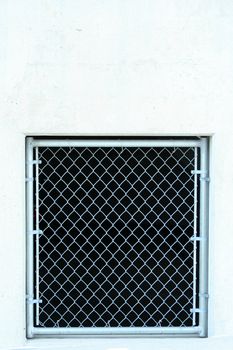 Chainlink fence gate with wall