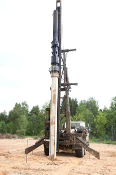 pile driver performs work