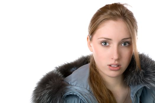 The girl in  warm jacket with a hood isolated on  white background