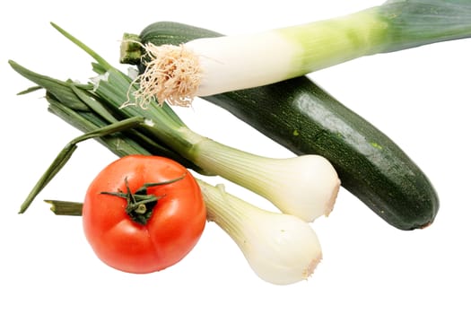 vegetables composed of chopped green onions and zucchini tomato leek trimmed and isolated