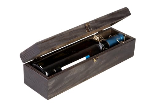 Wooden box with a bottle of wine on  white background