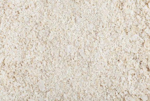 Nutritional yeast flakes food background