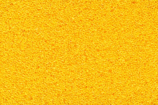 Detail shot of yellow sponge extreme closeup