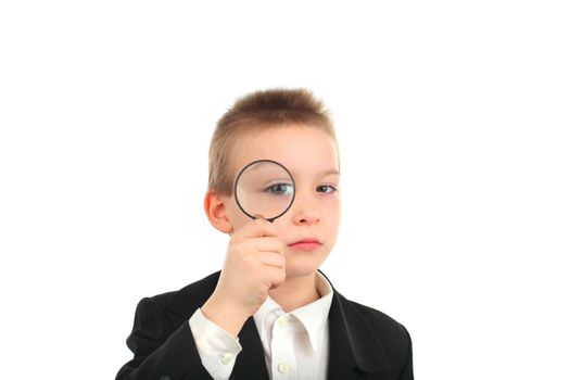 schoolboy with loupe isolated on the white