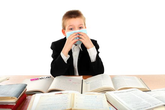 schoolboy in flu mask isolated on the white