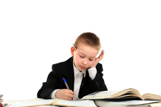 schoolboy sitting in the classroom