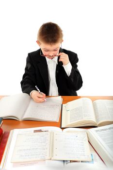 schoolboy sitting in the classroom