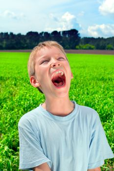 portrait of screaming boy outdoor