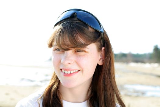 freckled teenage girl portrait outdoor