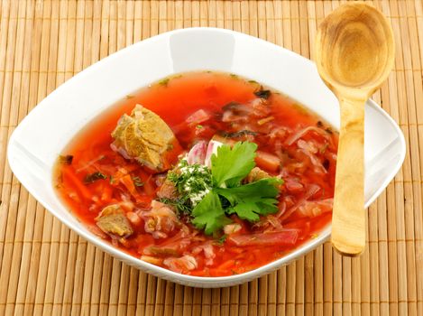 Ukrainian and russian national homemade red soup Borscht closeup