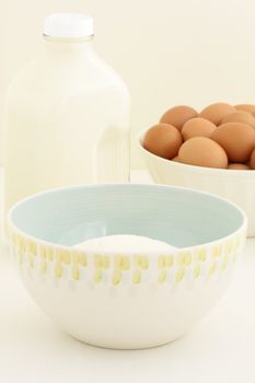 Milk, eggs and flour fresh and basic baking ingredients