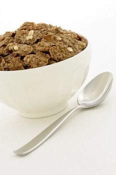 Delicious and nutritious bran flakes cereal, high in bran, high in fiber, served in a beautiful  French Cafe au Lait Bowl with wide rims.  This healthy bran cereal will be an aid to digestive health. 