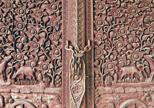 The Carving wood of door at temple