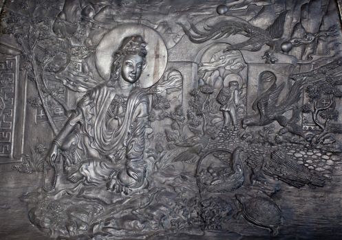 Carved stone at erawan museum,Thailand