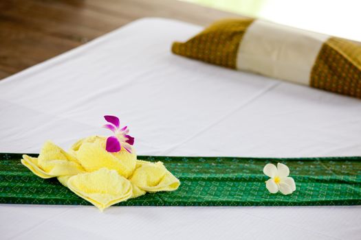 spa objects with tropical flowers and leaves