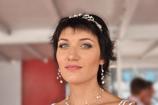 Portrait of young woman in her wedding day