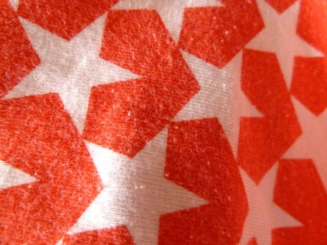 white star pattern on red fabric