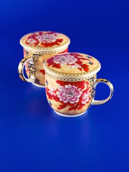 Tea cups on a blue background 