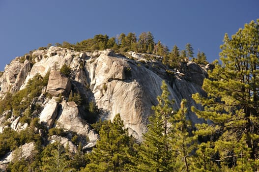 Mount San Jacinto in Southern California features numerous granite peaks along with dense pine forests.