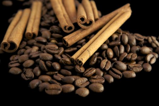 Coffee beans with cinnamon sticks