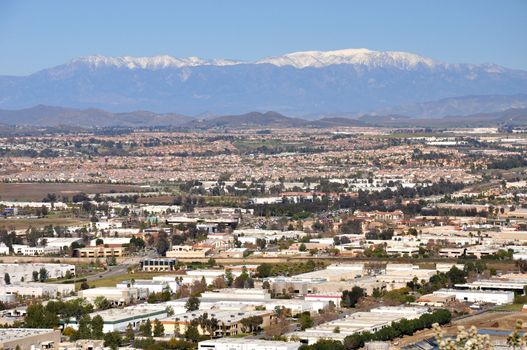 Snow-capped Mount San Gorgonio rises above the city of Murrieta, California.