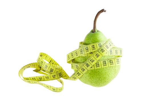 Ripe green pear with measuring tape