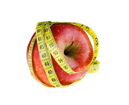 Ripe red apple with measuring tape 