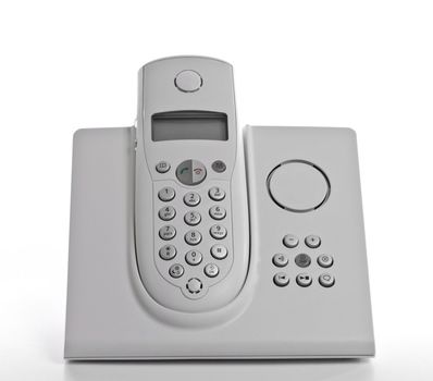 white cordless telephone with answering machine over white background