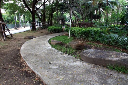 The curvy walk way of a city park