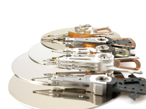 Heads and disks of hard drive over white