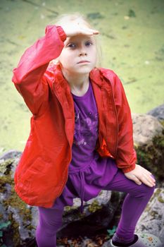 Portrait of Little Girl in Autumn Park