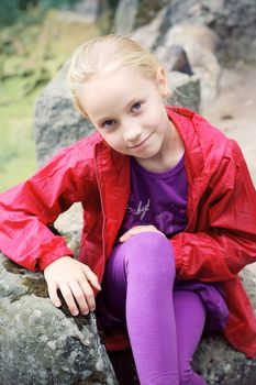 Portrait of Little Girl in Autumn Park