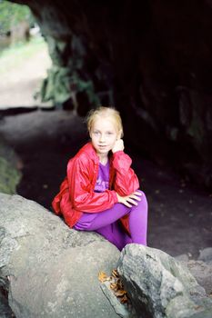 Portrait of Little Girl in Autumn Park