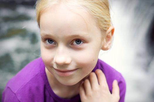 Portrait of Little Girl in Autumn Park