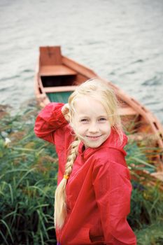 Portrait of Little Girl in Autumn Park