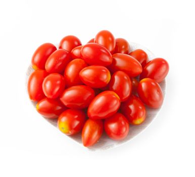 Small tomato on white background